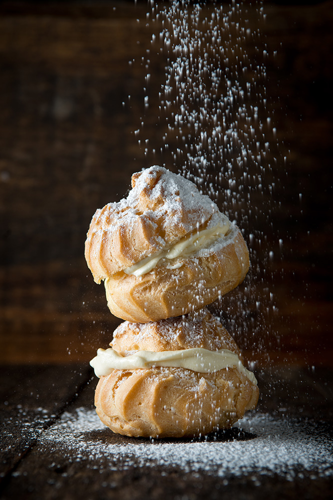 cream puffs with powdered sugar - still life food photography
